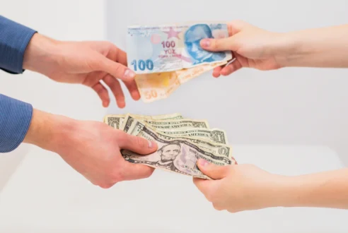 Comment éviter les arnaques au change de devises en voyage ?